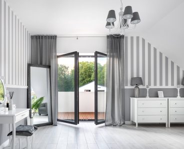 Romantic style gray room with white dressing table and chest of drawers